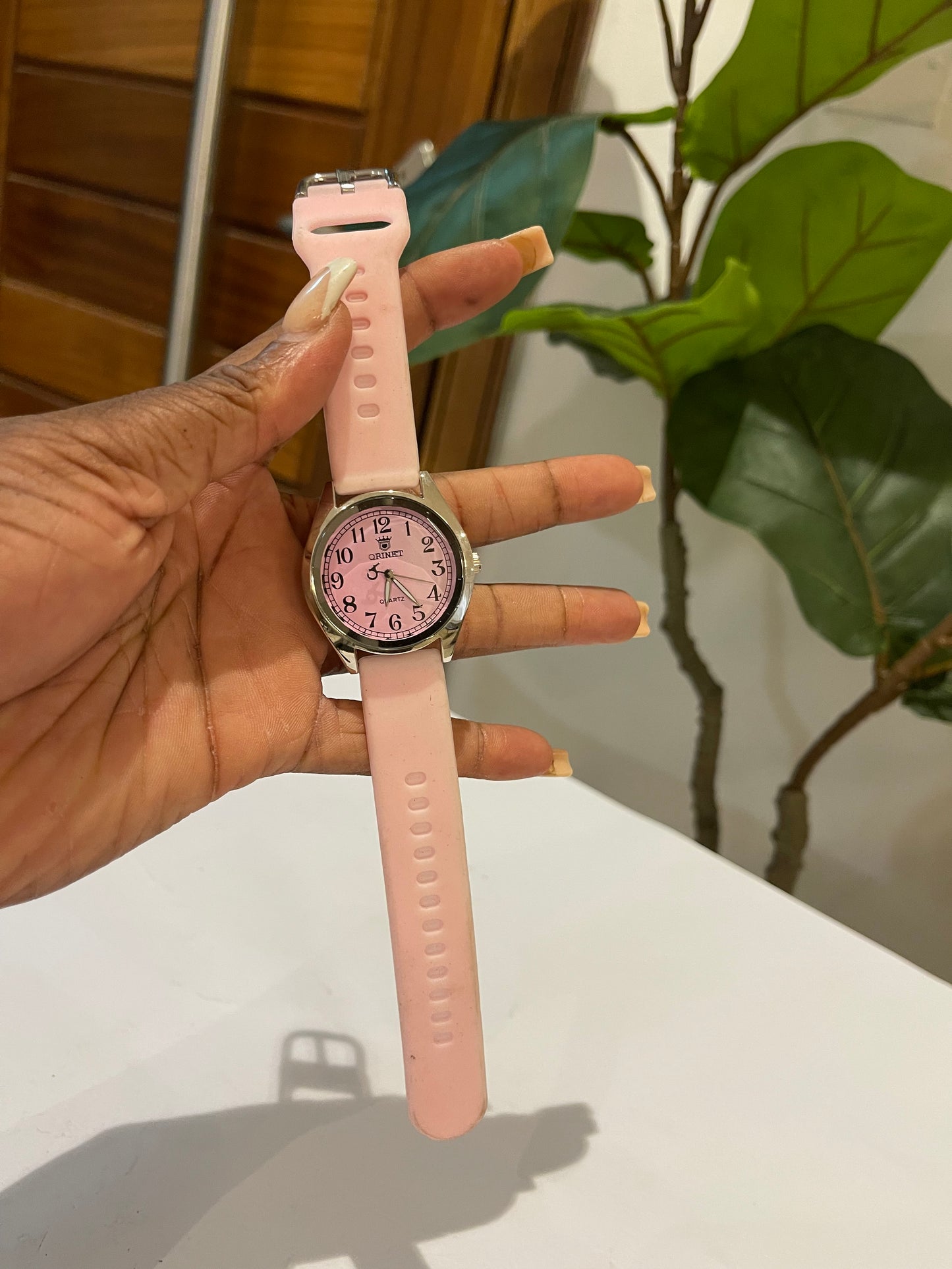 Pink detailed wristwatch