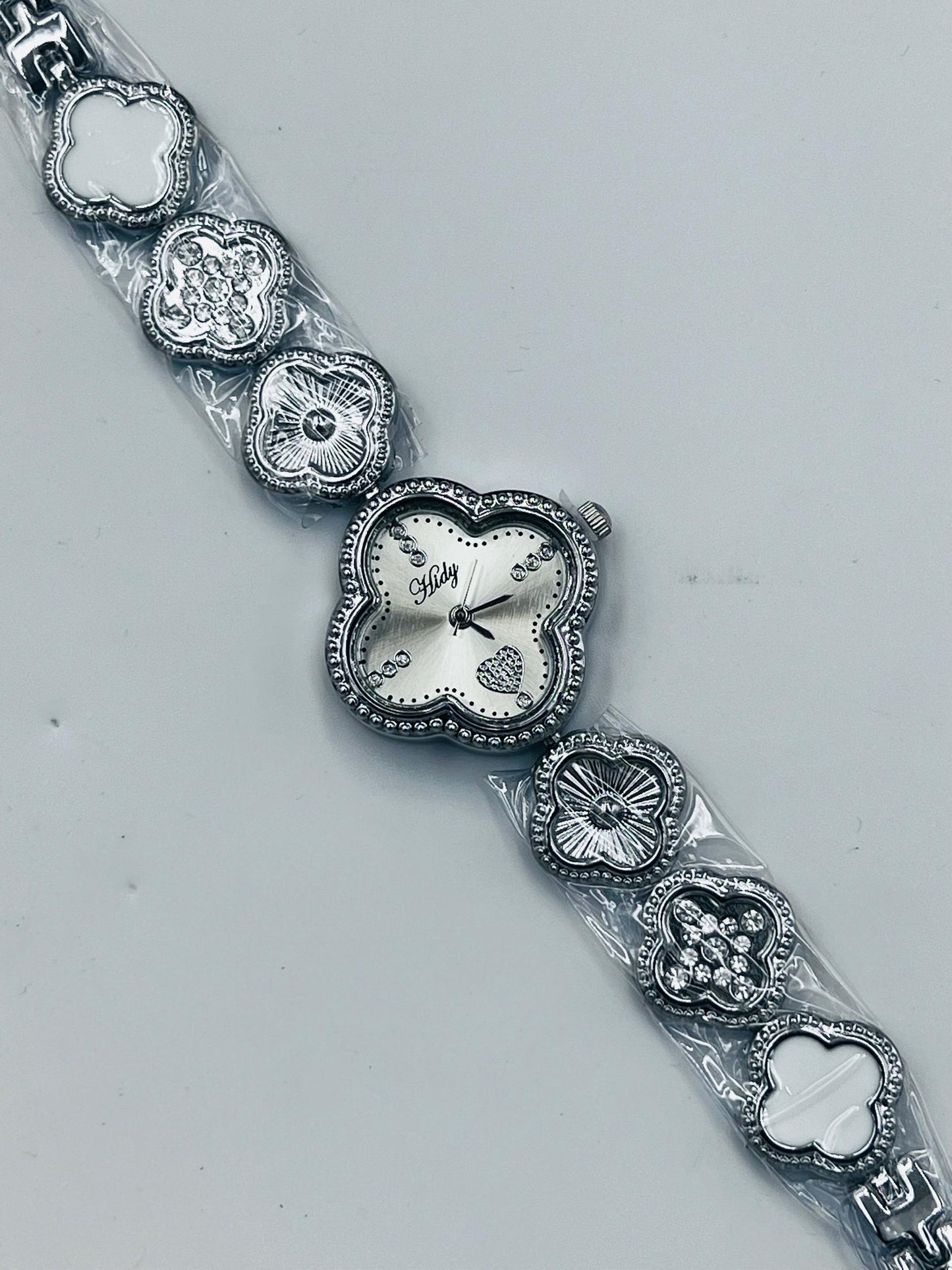 Silver van cleef inspired wristwatch