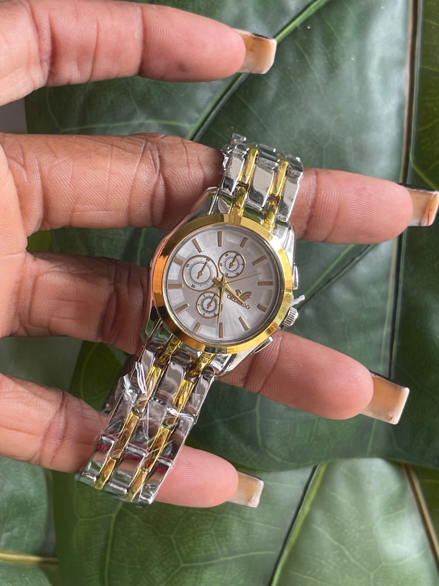 Gold and silver wristwatch