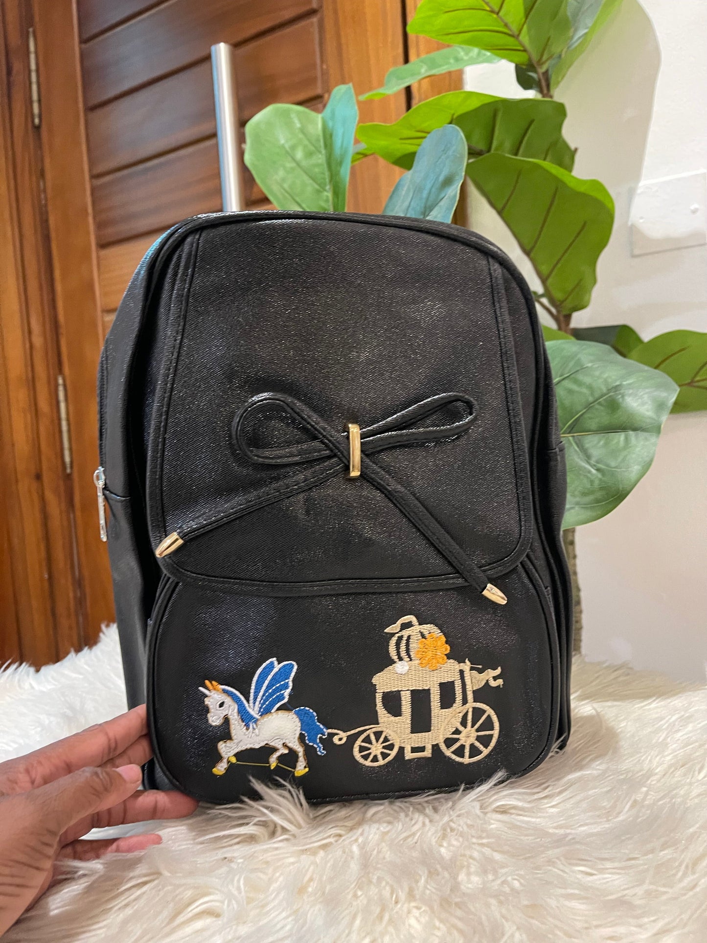 Black bow tie backpack